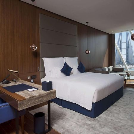 Wyndham Grand Manama Hotel Exterior photo A bedroom at the hotel
